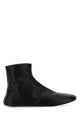 The Row Stella Ankle Boots Black In Leather And Shearling
