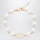 Valentino Garavani Vlogo Signature Bracelet In Metal And Pearls, Gold/Cream