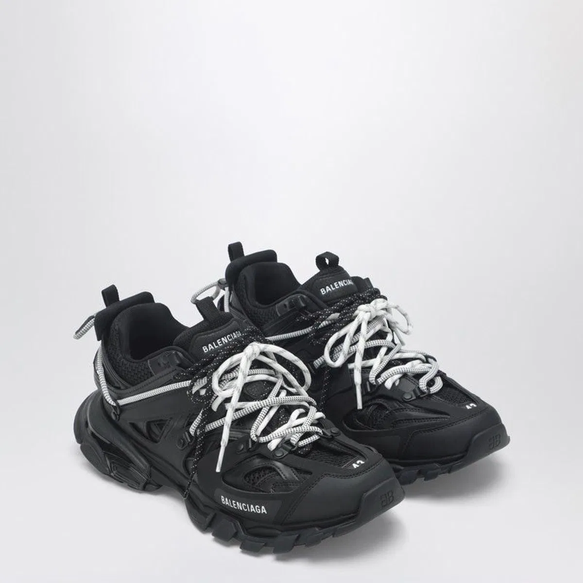 Low Track Sneakers In Black And White