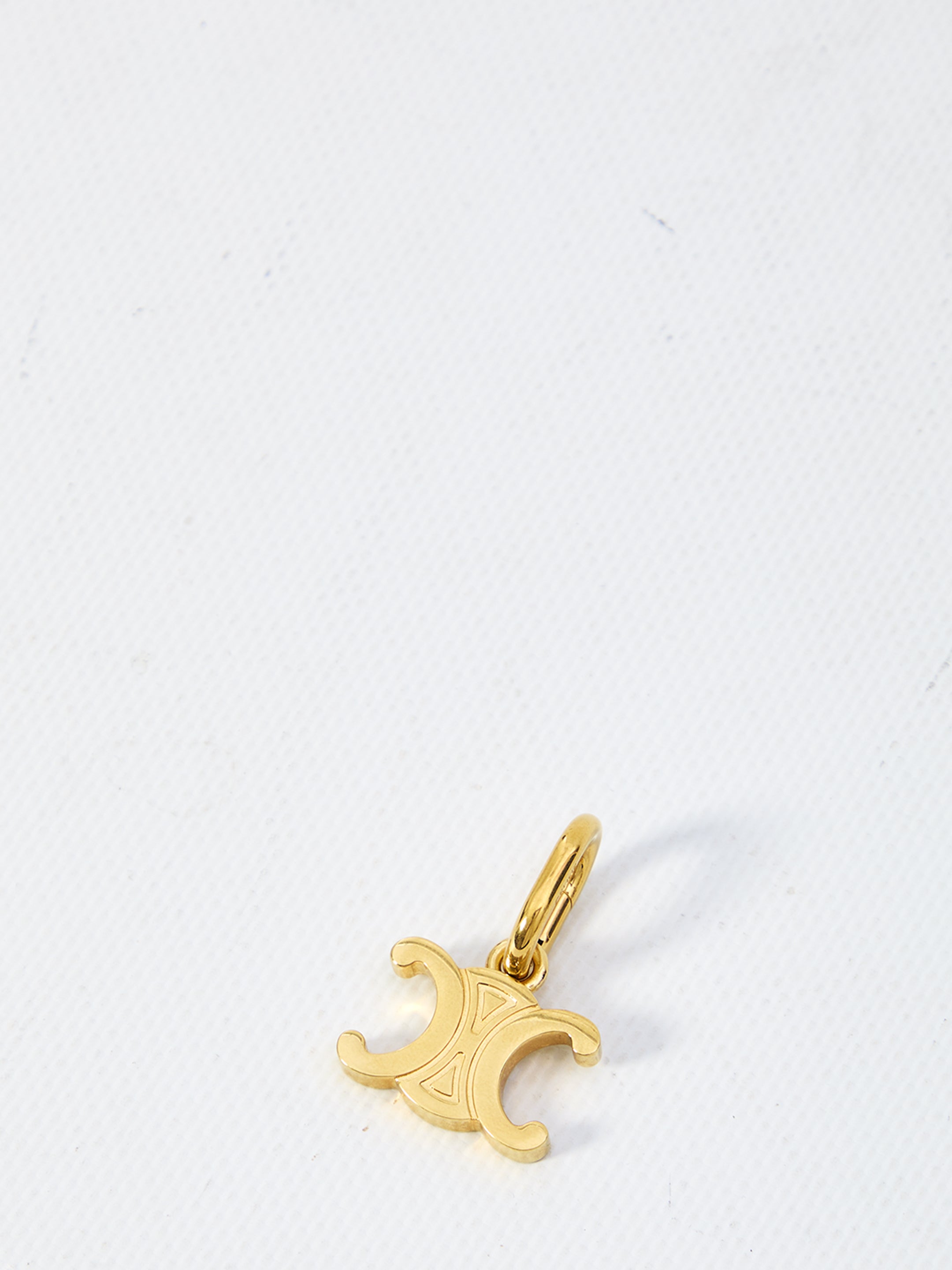 Gold Brass Triomphe Charm